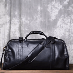 CarryQuest® Zwarte Lederen Weekender Bag – 52x26x17cm – Duurzaam Runderleer – Perfect voor Reizen en WeekendtripsCarryQuestReis - /WeekendtasDone